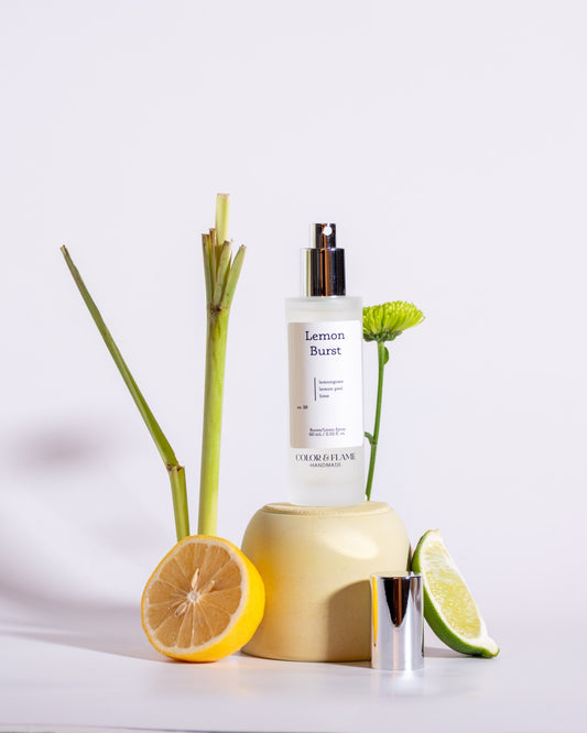 Color & Flame Handmade Lemon Burst room and linen spray styled with lemon, lime, lemongrass, and green florals.