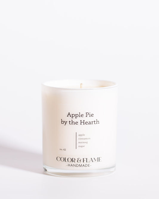 Color & Flame Handmade Apple Pie by the Hearth Core Collection candle in a white glass jar.
