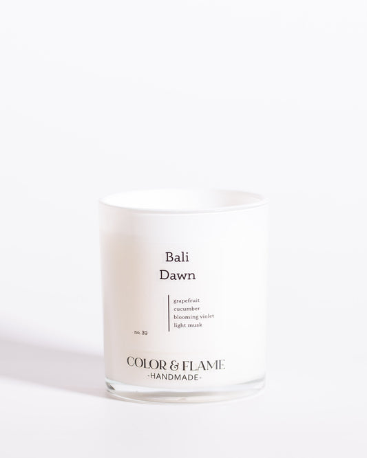 Color & Flame Handmade Bali Dawn Core Collection candle in a white glass jar.
