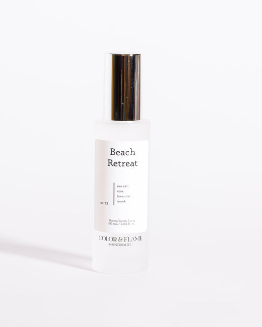 Color & Flame Handmade Beach Retreat room and linen spray bottle with its silver cap attached.
