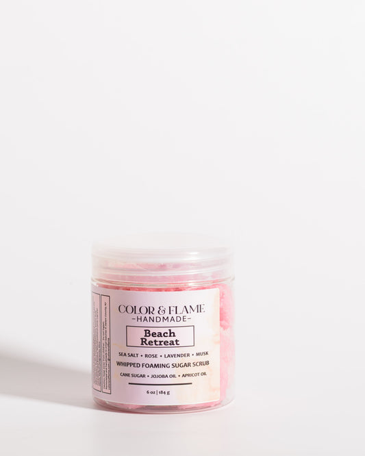 Color & Flame Handmade Beach Retreat whipped foaming sugar scrub in a clear jar with a pink label.
