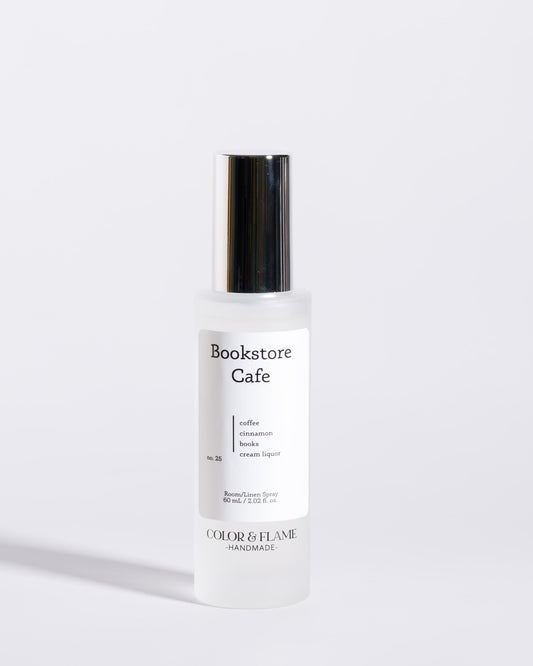 Color & Flame Handmade Bookstore Cafe room and linen spray bottle with its silver cap attached.
