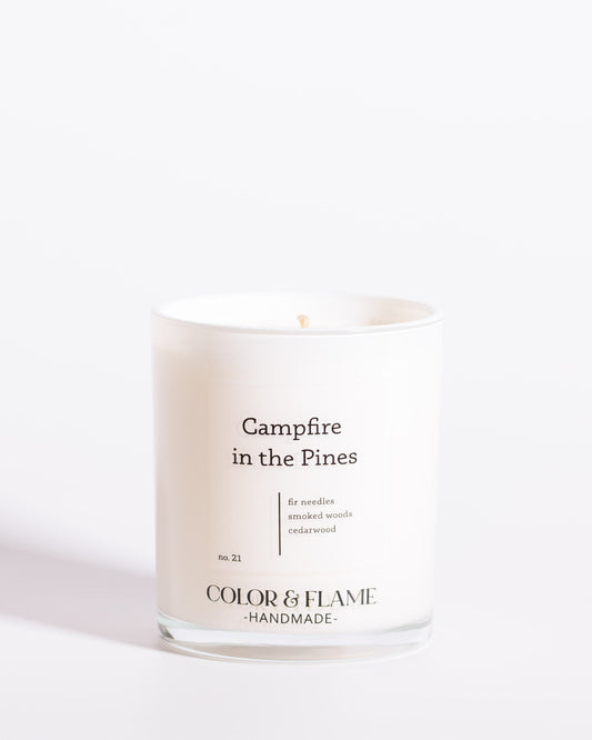 Color & Flame Handmade Campfire in the Pines Core Collection candle in a white glass jar.
