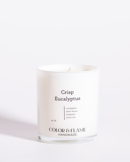 Color & Flame Handmade Crisp Eucalyptus Core Collection candle in a white glass jar.
