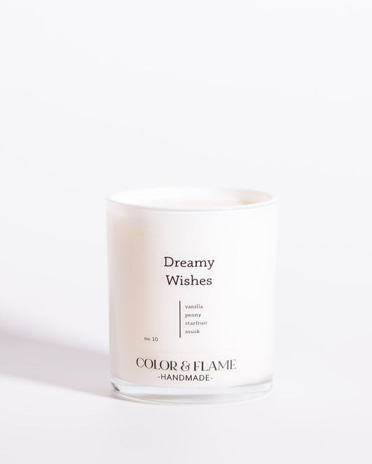 Color & Flame Handmade Dreamy Wishes Core Collection candle in a white glass jar.
