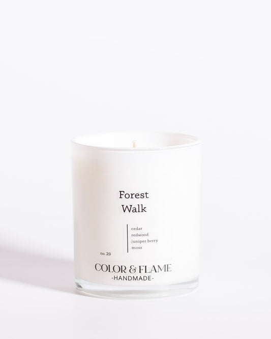 Color & Flame Handmade Forest Walk Core Collection candle in a white glass jar.
