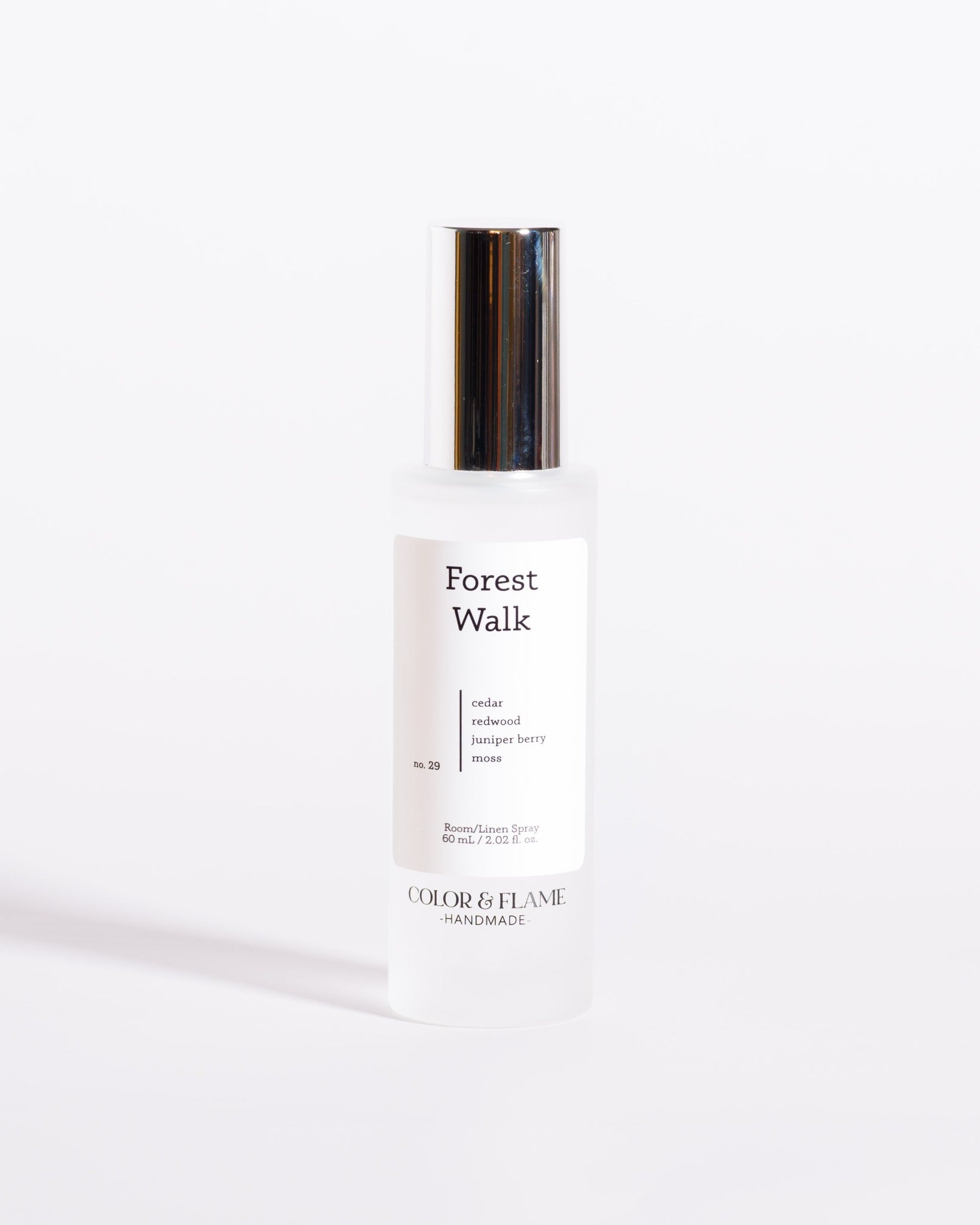 Color & Flame Handmade Forest Walk room and linen spray bottle with its silver cap attached.
