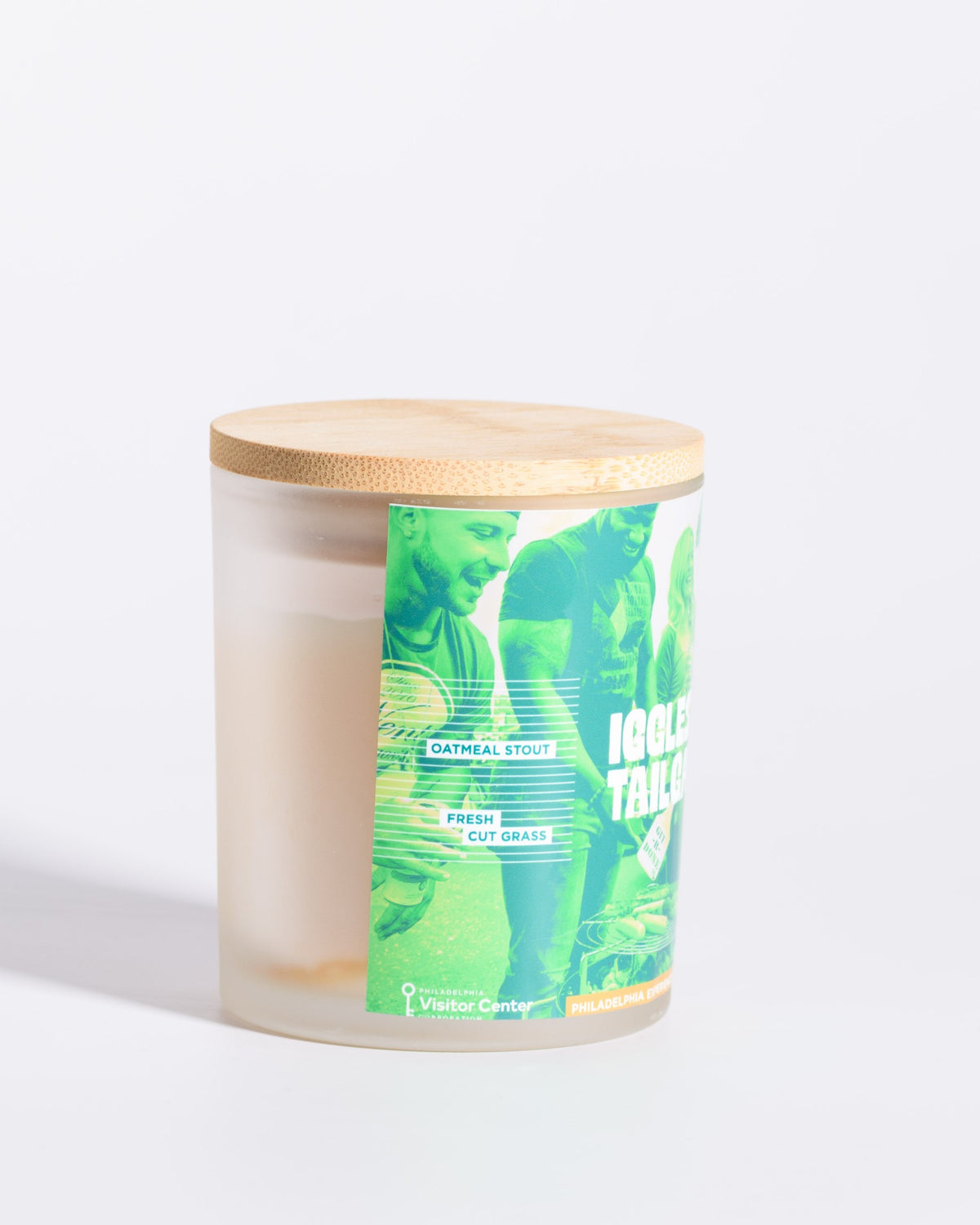 Left-side label view of the Color & Flame Handmade Iggles Tailgate Philadelphia Experiences candle.
