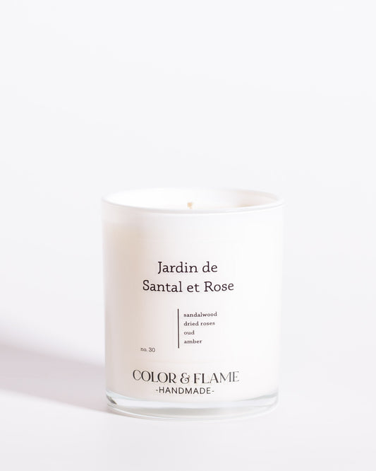 Color & Flame Handmade Jardin de Santal et Rose Core Collection candle in a white glass jar.
