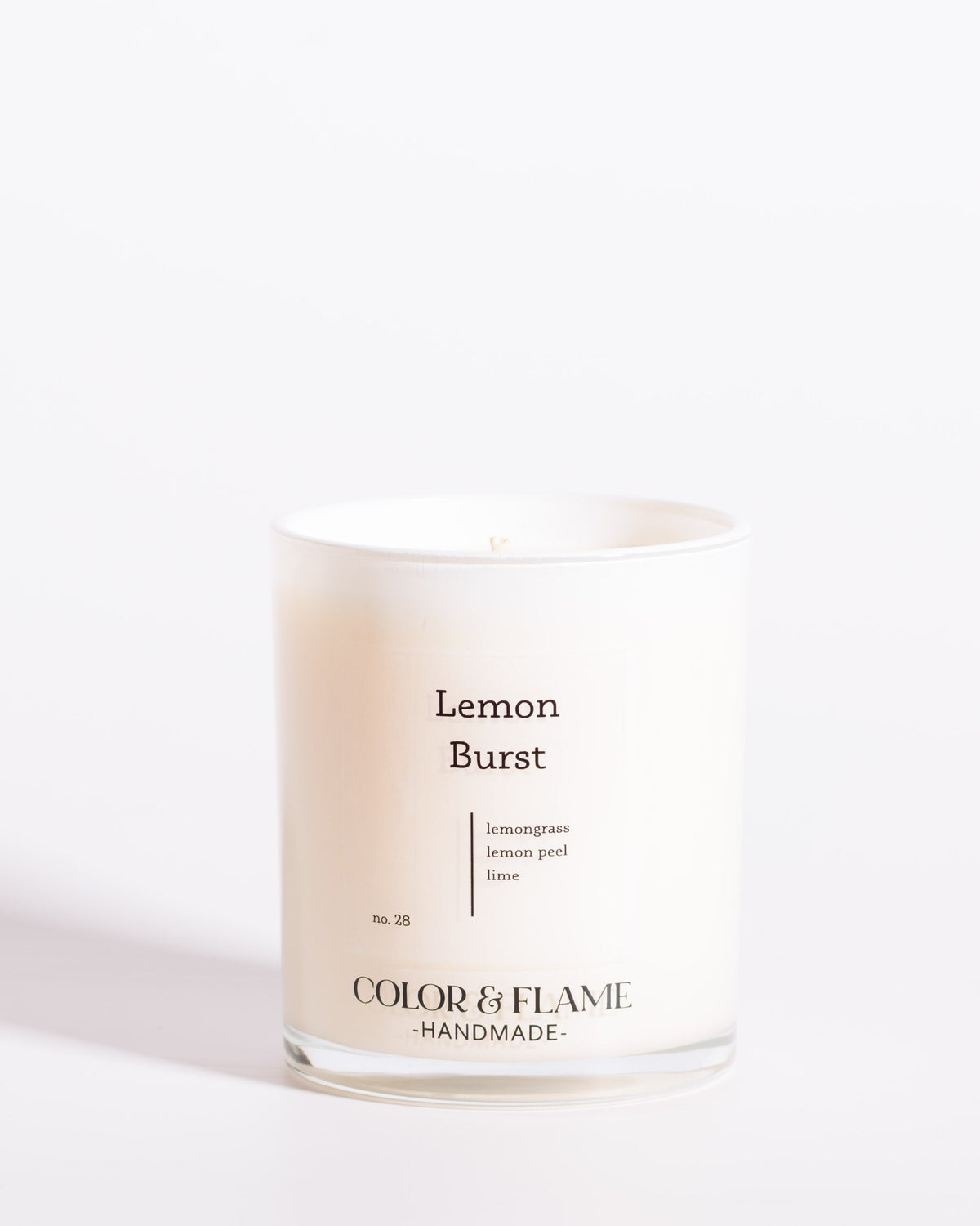 Color & Flame Handmade Lemon Burst Core Collection candle in a white glass jar.
