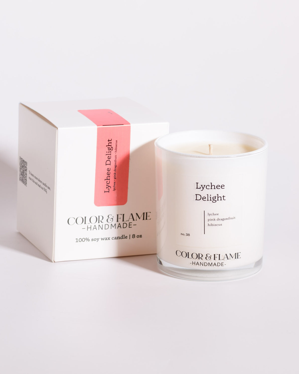 Color & Flame Handmade Lychee Delight Core Collection candle displayed beside its white box.
