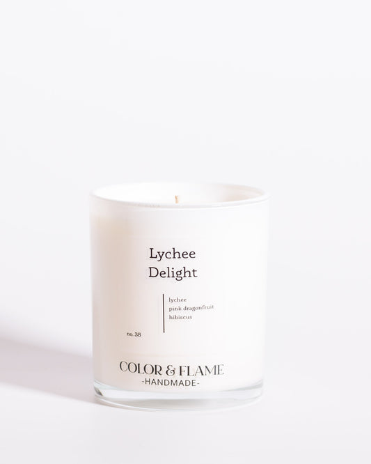 Color & Flame Handmade Lychee Delight Core Collection candle in a white glass jar.
