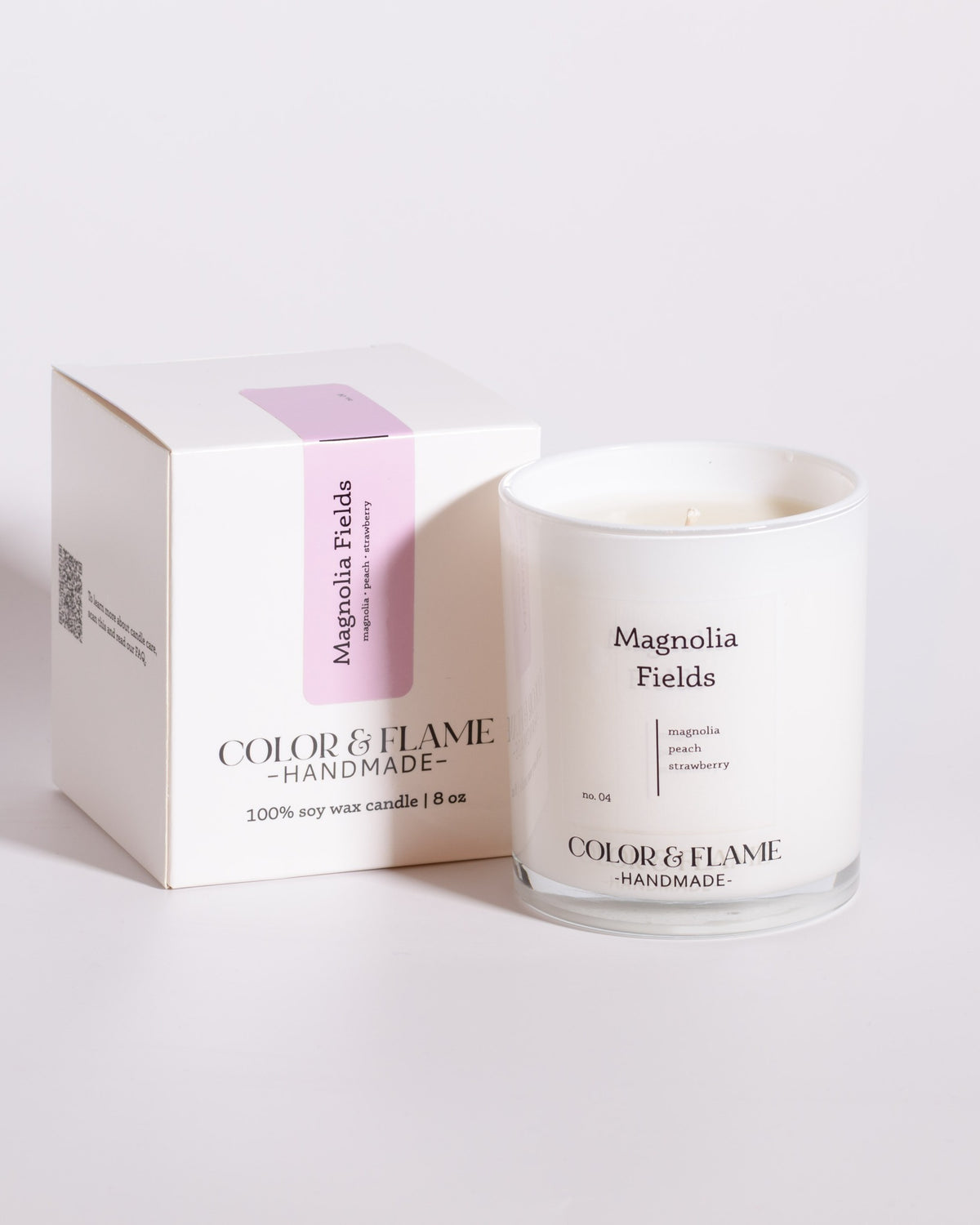 Color & Flame Handmade Magnolia Fields Core Collection candle displayed beside its white box.
