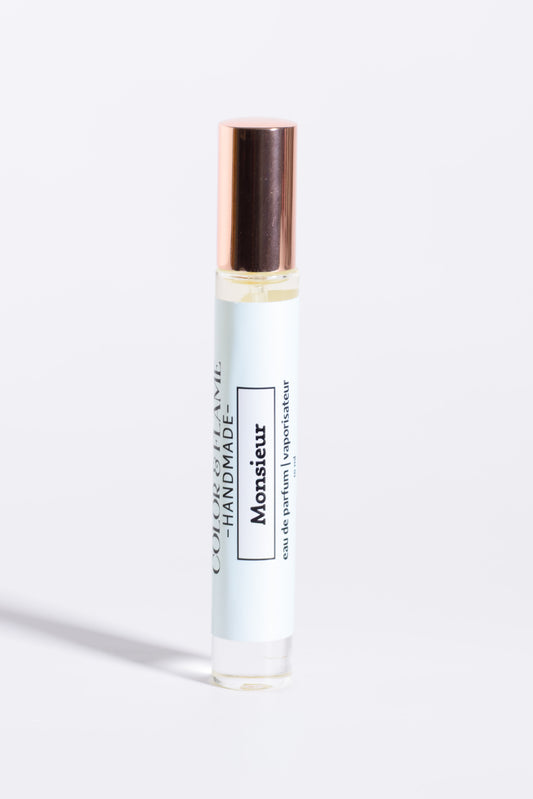 Color & Flame Handmade Monsieur 10 ml perfume spray with its rose-gold cap attached.
