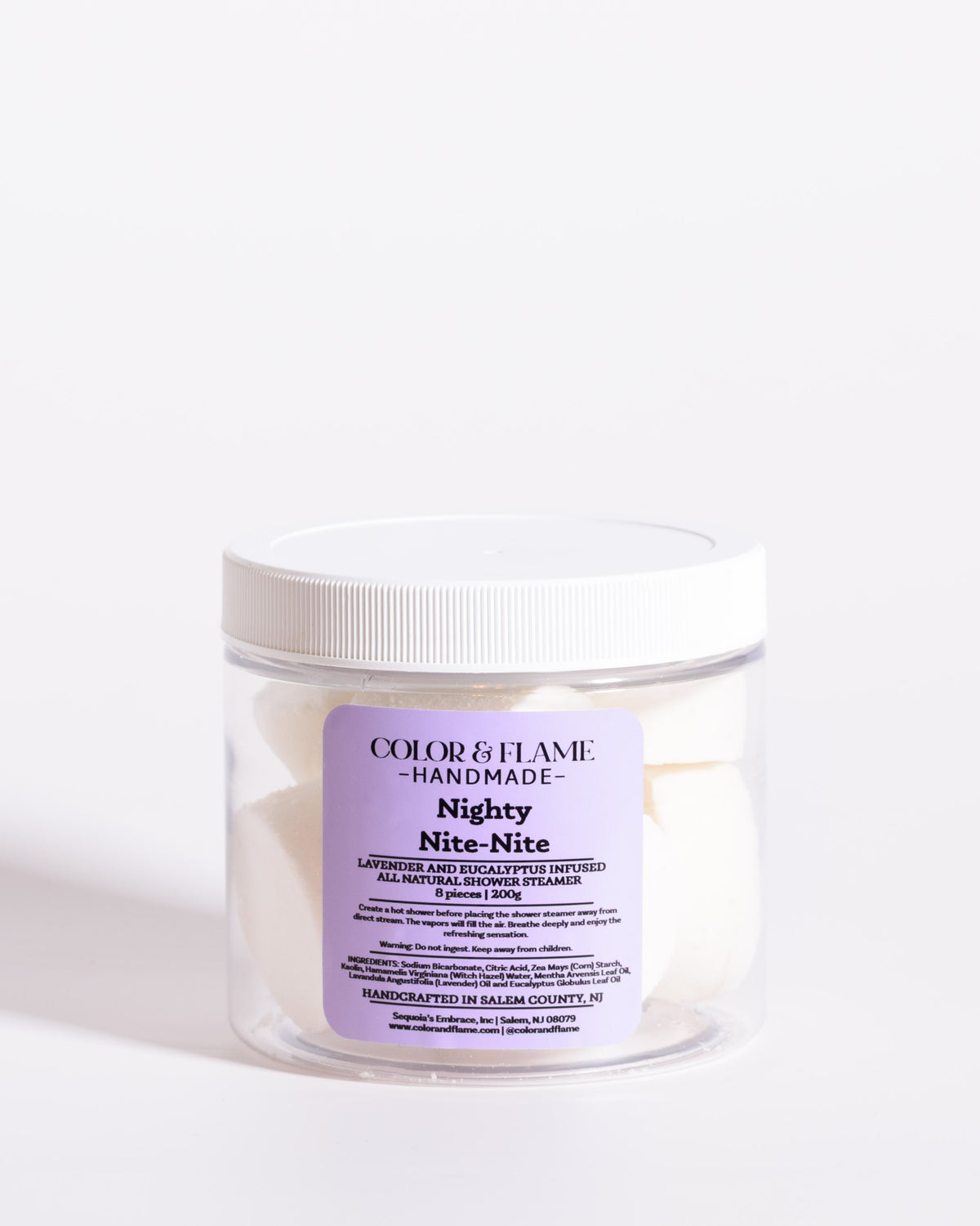 Color & Flame Handmade Nighty Nite-Nite lavender and eucalyptus shower steamers in a clear jar.