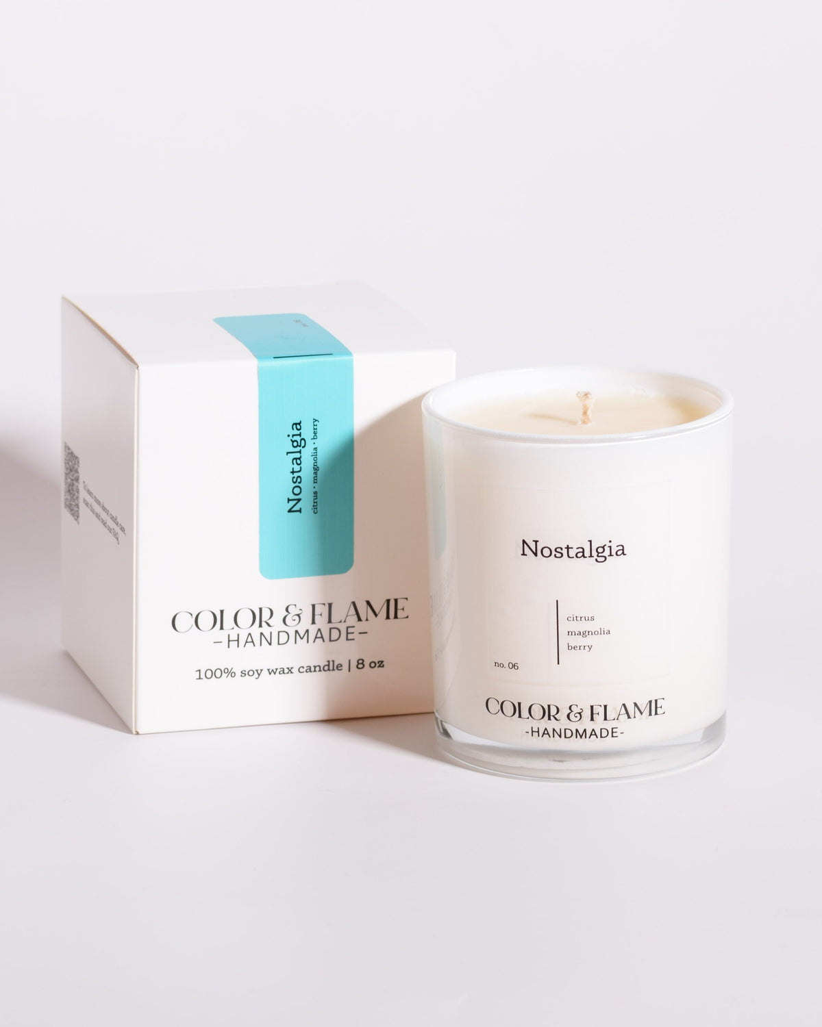 Color & Flame Handmade Nostalgia Core Collection candle displayed beside its white box.
