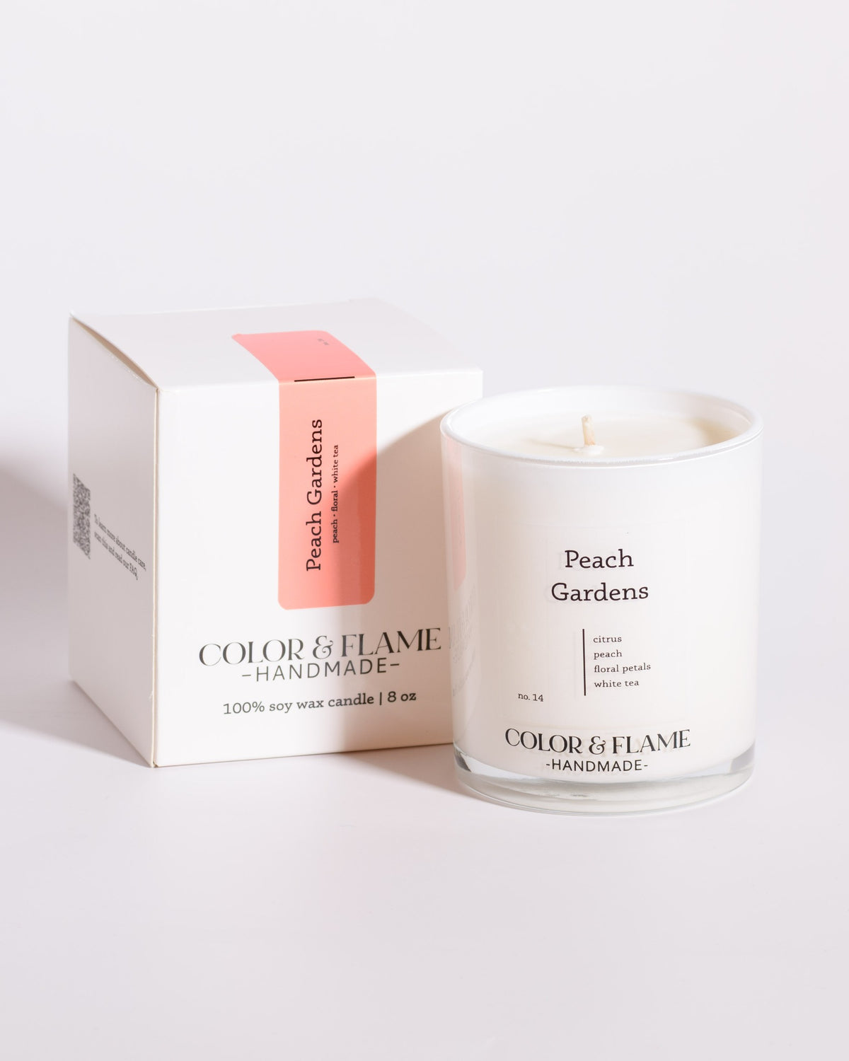 Color & Flame Handmade Peach Gardens Core Collection candle displayed beside its white box.
