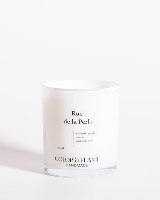 Color & Flame Handmade Rue de la Perle Core Collection candle in a white glass jar.
