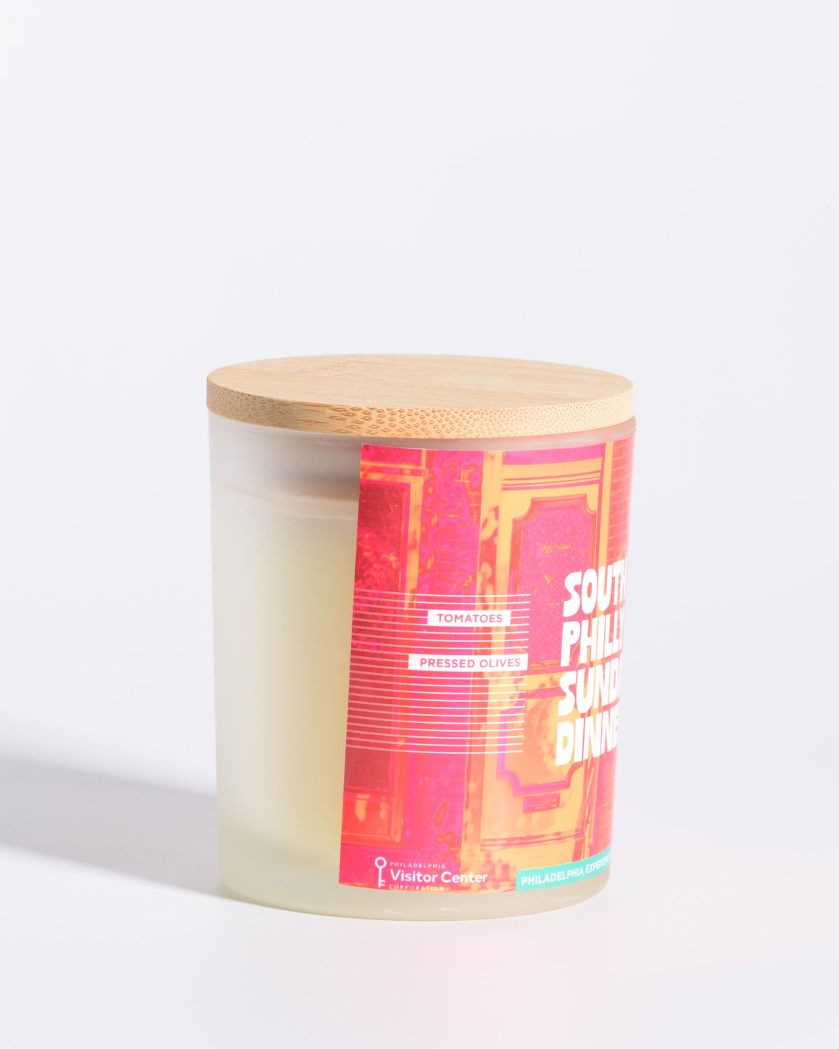 Left-side label view of the Color & Flame Handmade South Philly Sunday Dinner Philadelphia Experiences candle.
