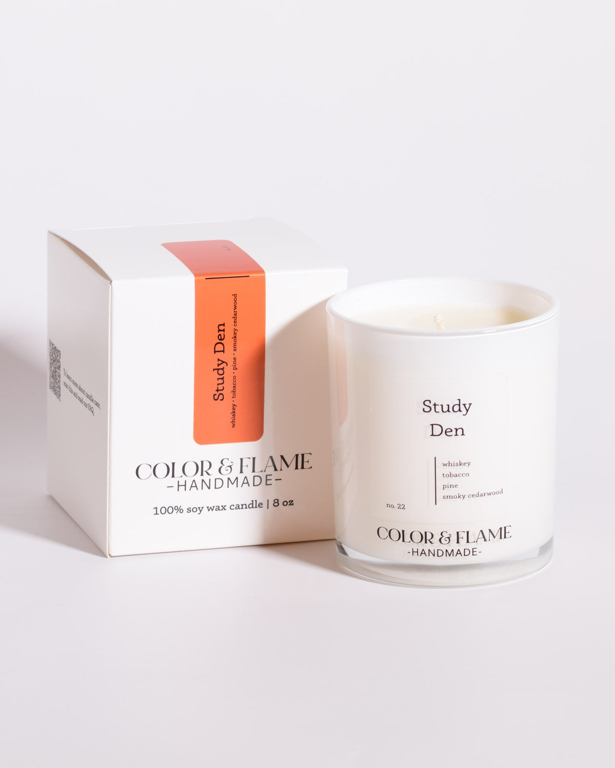 Color & Flame Handmade Study Den Core Collection candle displayed beside its white box.
