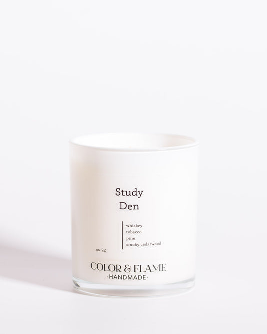Color & Flame Handmade Study Den Core Collection candle in a white glass jar.

